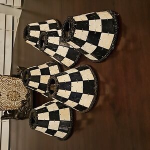 Carved bone lamp shades w/wood beaded trim. Small clip on. Black and cream.